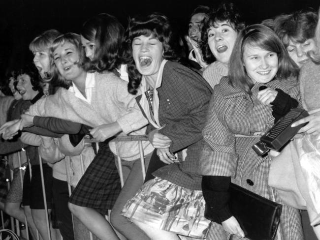 Hysterical fans at Sydney Airport waiting for The Beatles, 1964.