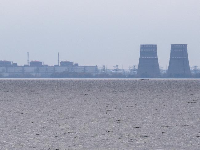 PRYDNIPROVSKE, UKRAINE - OCTOBER 29: Zaporizhzhia Nuclear Power Plant, Europe's largest nuclear power station and currently held by Russian occupying forces, is pictured on October 29, 2022 from Prydniprovske in Dnipropetrovsk oblast, Ukraine. Ukrainian forces have reportedly carried out a large-scale drone attack on Russia's Black Sea Fleet in the Crimean port city of Sevastopol according to Russian officials. Russia has accused British troops of involvement in the attack, the allegation has been denied by Britain's Ministry of Defence. (Photo by Carl Court/Getty Images)