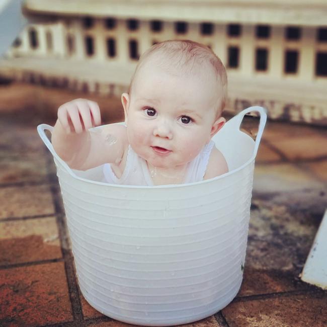 William Power cooling off in the tub from the Darwin heat.
