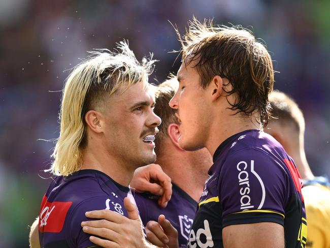 MELBOURNE, AUSTRALIA - MARCH 09:  Ryan Papenhuyzen of the Storm celebrates with team mates after scoring a try during the round one NRL match between the Melbourne Storm and the Parramatta Eels at AAMI Park on March 09, 2025, in Melbourne, Australia. (Photo by Quinn Rooney/Getty Images)