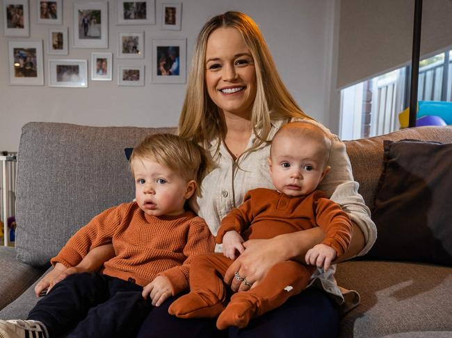 Former olympian Rachael Dutschke with husband Josh and kids Banjo, 4 months and Bodhi, 21 months, on July 4th, 2024, at her Lower Mitcham home.Picture: Tom Huntley