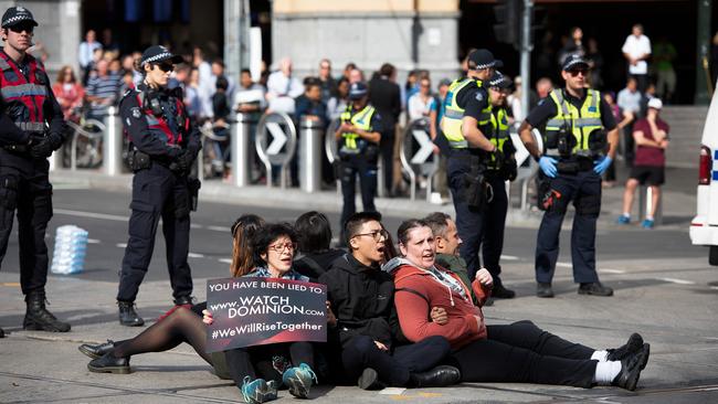 Animal rights protesters block the intersection of Flinders and Swanston Street in Melbourne in April. Picture: AAP