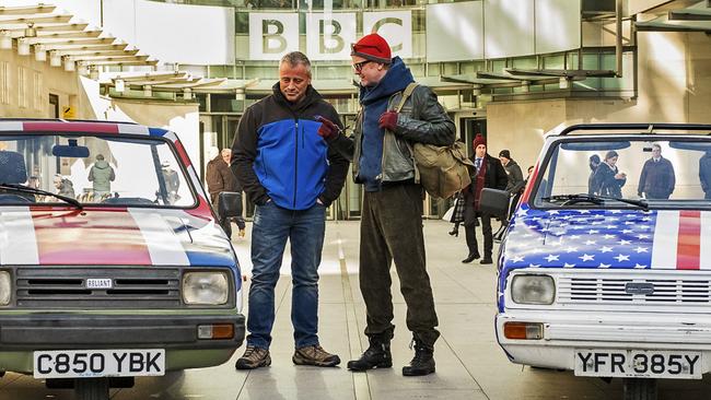 Chris Evans, right, speaks with Top Gear co-presenter Matt LeBlanc as they prepare for their first challenge in London.