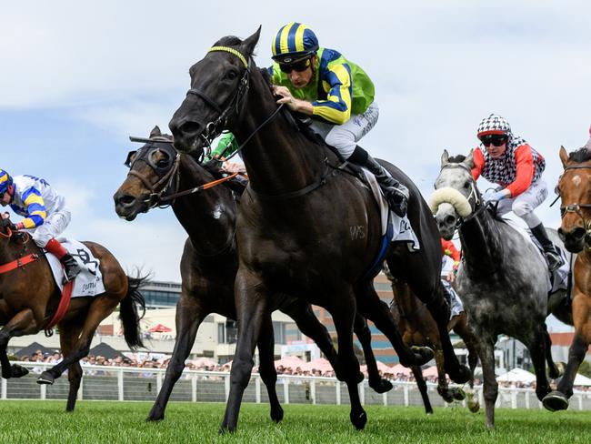 MELBOURNE, AUSTRALIA - NOVEMBER 26: Blake Shinn riding Milford winning Race 6, the Lamaro's Hotel Eclipse Stakes, during Melbourne Racing at Caulfield Racecourse on November 26, 2022 in Melbourne, Australia. (Photo by Vince Caligiuri/Getty Images)