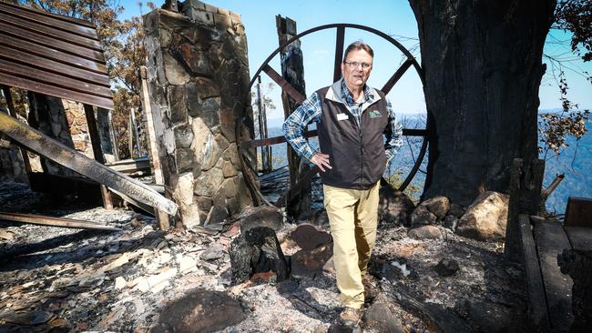 Steve Noakes surveys the ruins of Binna Burra Lodge in September last year. Picture: Nigel Hallett