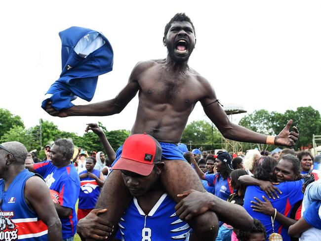 Walama Bulldogs celebrate their 2015 Tiwi Islands Football League premiership. Picture: Jake Nowakowski.