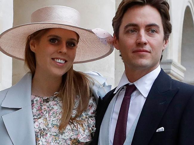 (FILES) In this file photo taken on October 19, 2019, Britain's Princess Beatrice and property tycoon Edoardo Mapelli Mozzi arrive to attend the wedding of prince Napoleon and Countess Olympia Arco-Zinneberg at the Saint-Louis-des-Invalides cathedral at the Invalides memorial complex in Paris. - Princess Beatrice, granddaughter of Queen Elizabeth II, will marry Italian businessman Edoardo Mapelli Mozzi on May 29 at Saint James Palace in London, Buckingham Palace announced on February 7, 2020. (Photo by FRANCOIS GUILLOT / AFP)