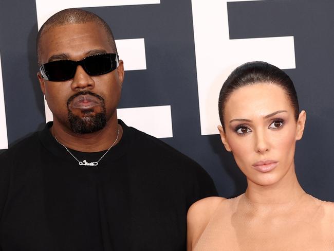 PIXELATED VERSIONS -  LOS ANGELES, CALIFORNIA - FEBRUARY 02: (EDITOR'S NOTE: Image contains nudity.) L-R, Kanye West and Bianca Censori attend the 67th Annual GRAMMY Awards on February 02, 2025 in Los Angeles, California.  (Photo by Matt Winkelmeyer/Getty Images for The Recording Academy)