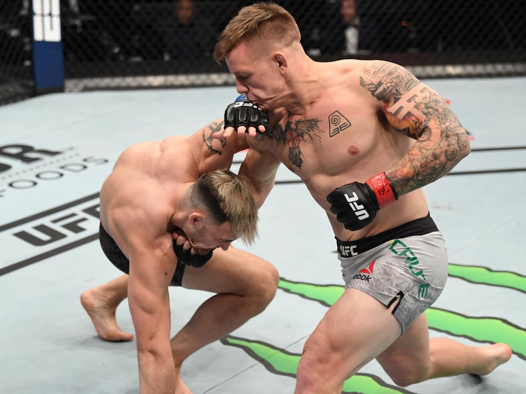 Jimmy Crute punches Modestas Bukauskas of Lithuania in their light heavyweight bout during the UFC Fight Night event inside Flash Forum on UFC Fight Island in Abu Dhabi. Picture: Josh Hedges/Zuffa LLC via Getty Images