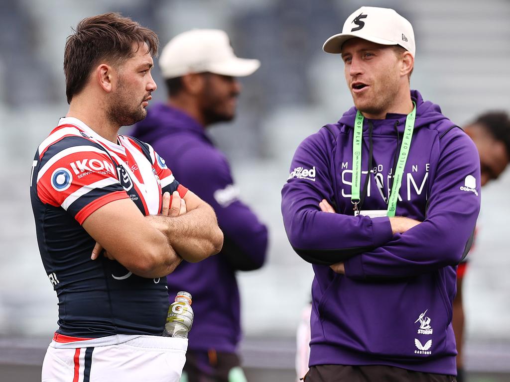 Former Storm teammates Smith and Cam Munster talk after the Roosters and Storm trial game in the pre-season. Picture: Michael Klein