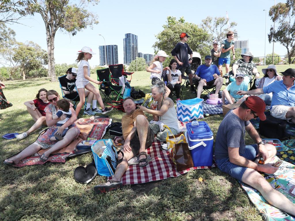 Picnickers gather in Footscray Park across from Flemington race course. NCA NewsWire / David Crosling