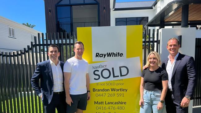 Owners Tim and Tegun Geary with agents Brandon Wortley and Matt Lancashire from Ray White at 42 Stewart Street, Hawthorne.