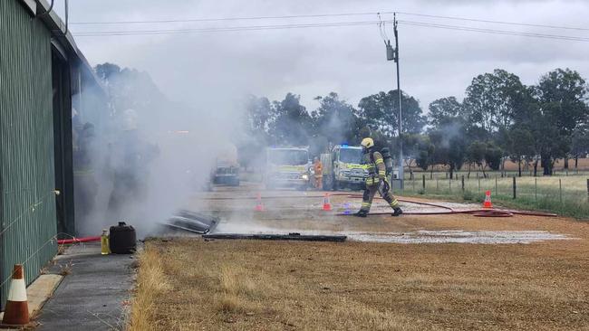 Firefighters tackle the blaze at the regional CFS training centre.