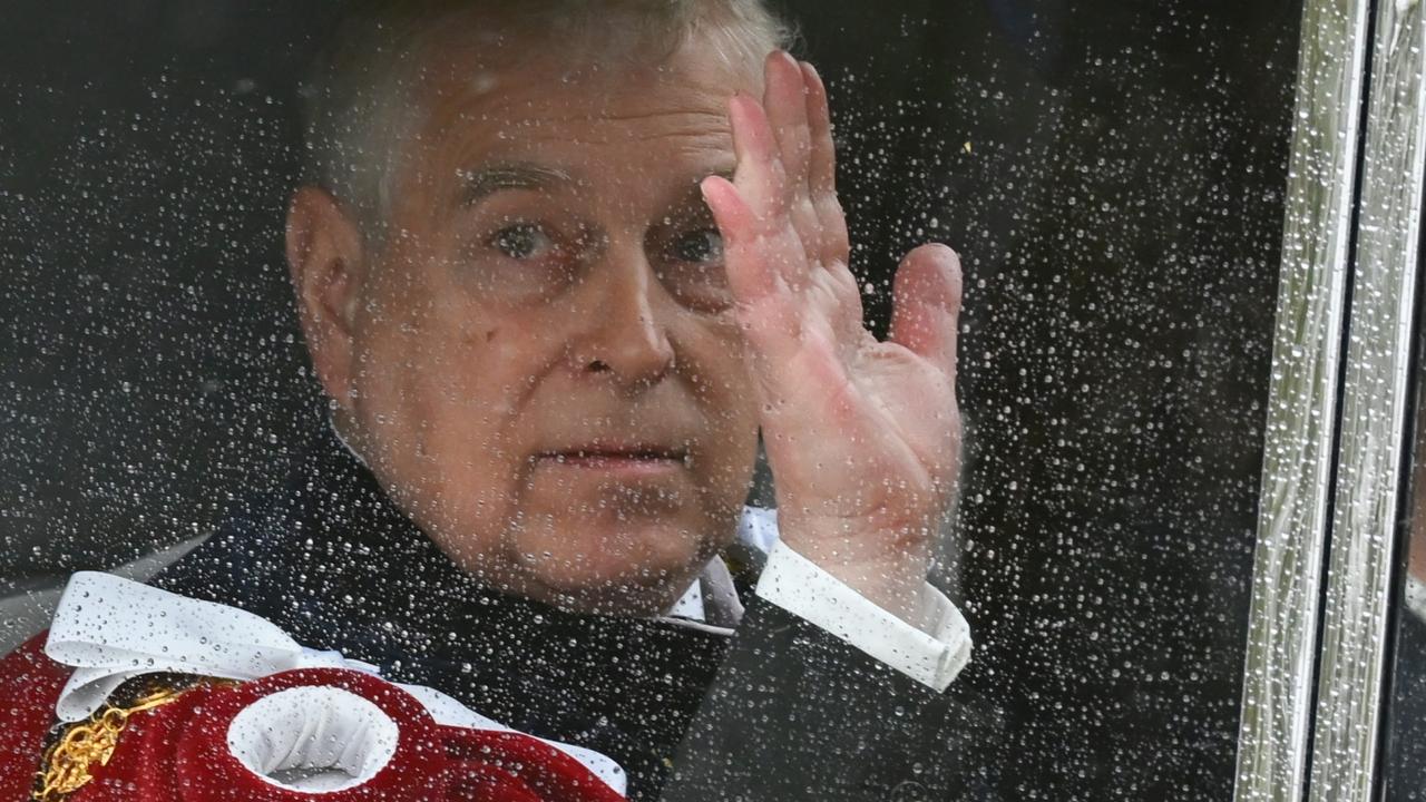 Prince Andrew, Duke of York, leaves Buckingham Palace with daughter Princess Eugenie. Picture: Marco Bertorello/AFP