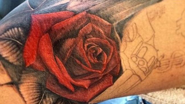 Rose tattoo with the sketch of a pistol on a Bondi Ink client which may be Salim Mehajer.