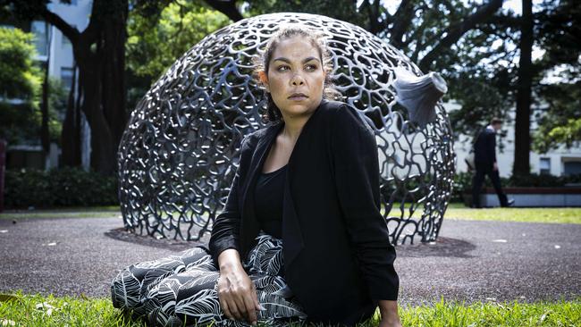 Angeline Penrith, at Redfern Park in Sydney, has had her Centrelink payment suspended and been unable to pay the rent after she failed to take her son to activities because she was working. Picture: John Feder