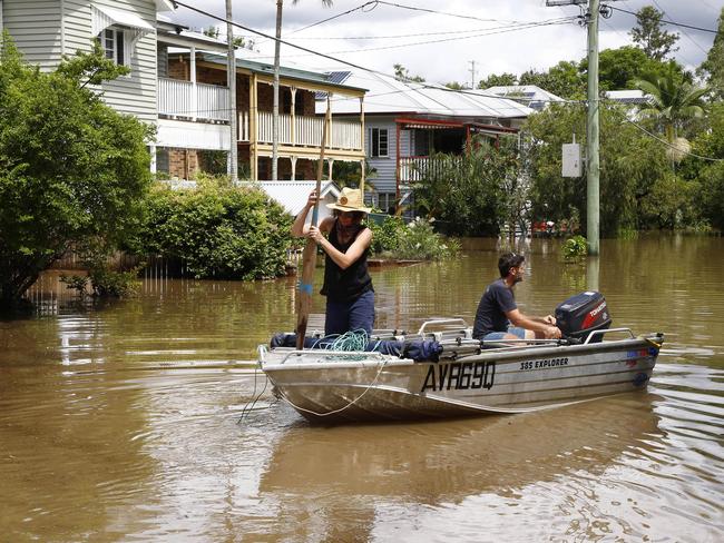 A couple inspects the floods in Forsythe street. Picture: Tertius Pickard