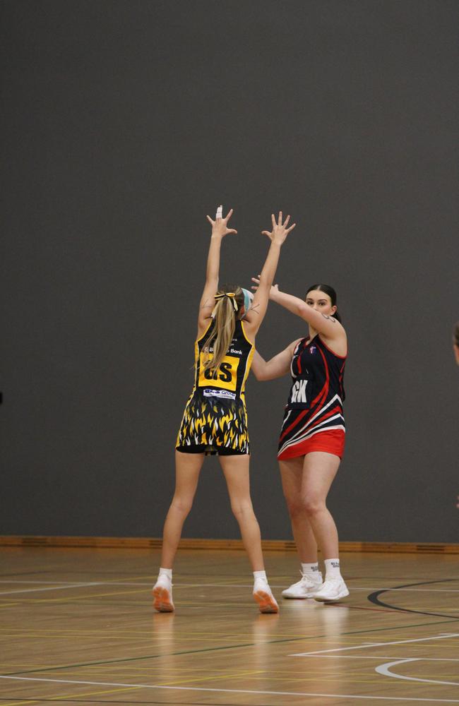 Netball action at QISSN 2024 held in Townsville. St Patrick's v St Thomas More