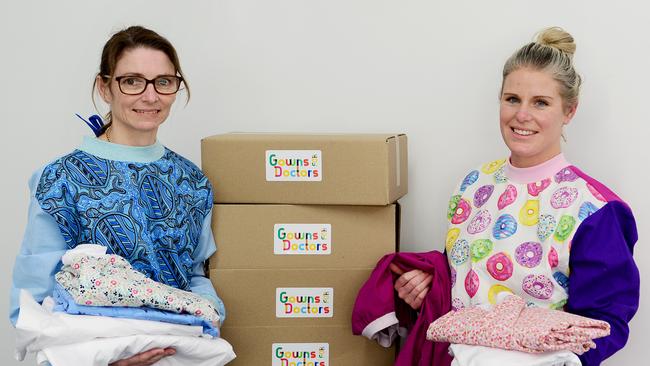 Coats of many colours: Doctors Nicole Townsend (left) and Kirby White organised volunteers and a GoFundMe campaign to help overcome a shortage of protective gowns for doctors in regional Victoria. Picture: Zoe Phillips