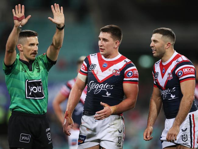 SYDNEY, AUSTRALIA - MAY 22:  Victor Radley of the Roosters is sent to the sin bin by referee Peter Gough as James Tedesco looks on during the round 11 NRL match between the Sydney Roosters and the Brisbane Broncos at Sydney Cricket Ground, on May 22, 2021, in Sydney, Australia. (Photo by Matt King/Getty Images)