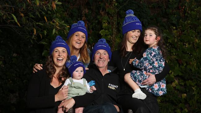 Neale Daniher with his wife Jan and daughters Bec Daniher and Lauren Daniher and grandchildren Billie and Rosie. Picture: Jake Nowakowski