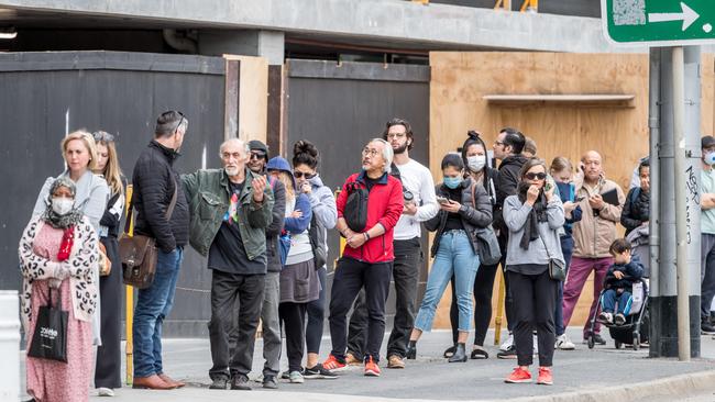 Hundreds of people lined up outside Centrelink in Abbotsford last week. Picture: Jake Nowakowski