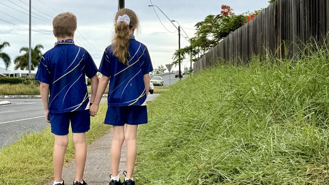 Mackay residents are frustrated at the long grass growing across the region. Pictured is 1m high grass growing alongside a footpath on Norris Rd which is used by students at Fitzgerald State School and Mackay North State High School. Picture: Heidi Petith