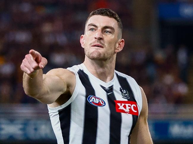 BRISBANE, AUSTRALIA - APRIL 17: Daniel McStay of the Magpies celebrates a goal during the 2025 AFL Round 06 match between the Brisbane Lions and the Collingwood Magpies at The Gabba on April 17, 2025 in Brisbane, Australia. (Photo by Russell Freeman/AFL Photos via Getty Images)