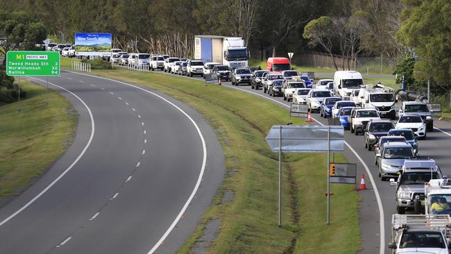 Traffic backed up for kilometres on the Gold Coast Highway and M1 after the border restrictions began. Picture: Scott Powick.