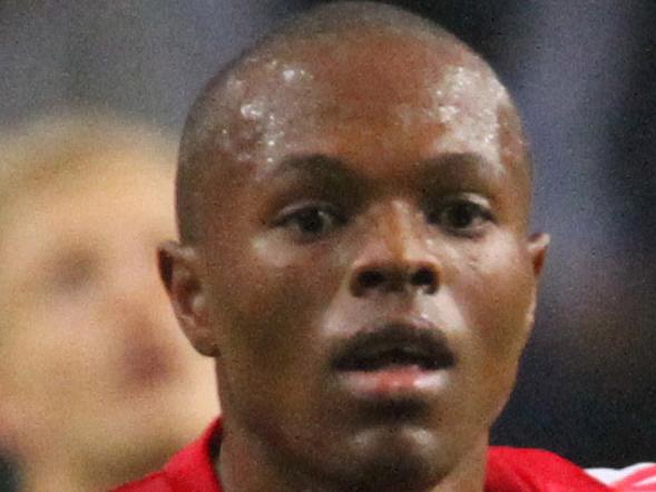 AMSTERDAM, NETHERLANDS - NOVEMBER 6: Thulani Serero of AFC Ajax in action during the UEFA Champion League group stage match between AFC Ajax and Celtic FC held on November 6, 2013 at the Amsterdam ArenA in Amsterdam, Netherlands. (Photo by Anoek de Groot/EuroFootball/Getty Images)