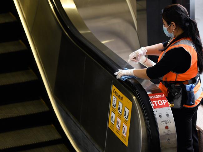 Across Brisbane, everyday heroes are going to work so we can stay home. Picture: AAP/Bianca De Marchi