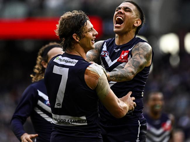 Fyfe celebrates a goal with an overjoyed Michael Walters. Picture: AFL Photos/Getty Images