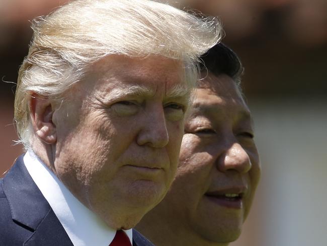 US President Donald Trump, left, has demanded Chinese President Xi Jinping use his nation’s clout with North Korea to rein in its nuclear and missile programs. Picture: Alex Brandon/AP