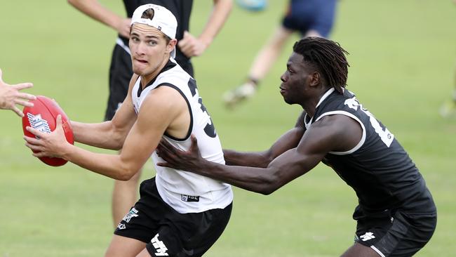 Boyd Woodcock, left, in action at the Power’s Noosa training camp.