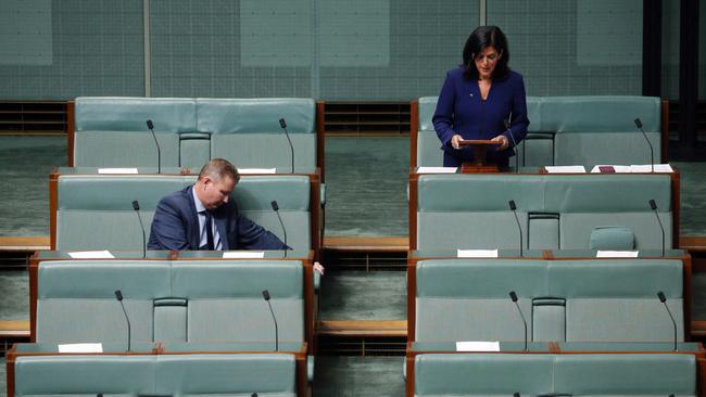 Liberal MP Craig Laundy listens as Julia Banks tells the House of Representatives that she has resigned as an Liberal backbencher to become an independent. Picture: Gary Ramage