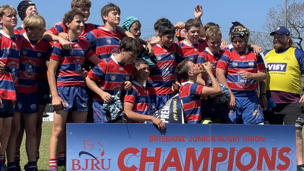 Riley Young kisses the trophy after an influential performance from flyhalf.