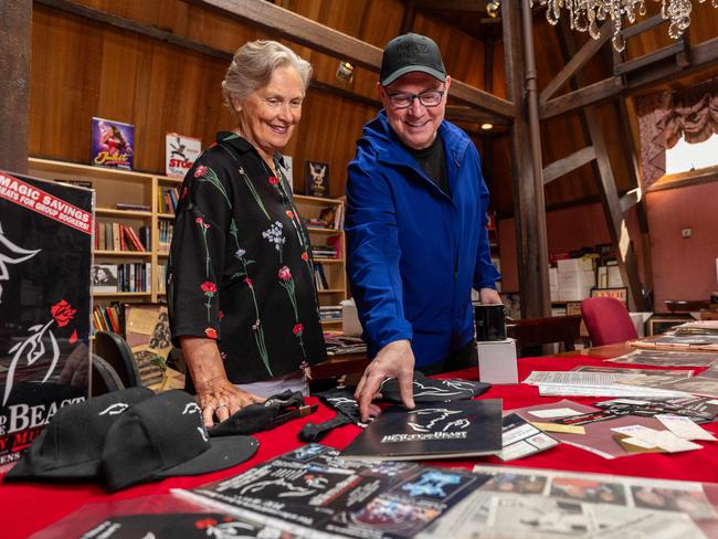 Matt West with Elaine Marriner in the Princess Theatre archives, with materials from Beauty and the Beast’s ‘90s run. Picture: Jason Edwards