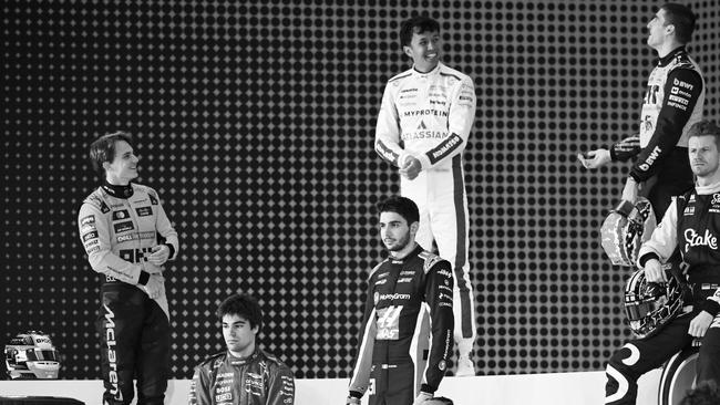 McLaren’s Oscar Piastri, Williams driver Alexander Albon and Alpine’s Jack Doohan talk during the drivers photocall prior to F1 testing at Bahrain. (Photo by Rudy Carezzevoli/Getty Images)