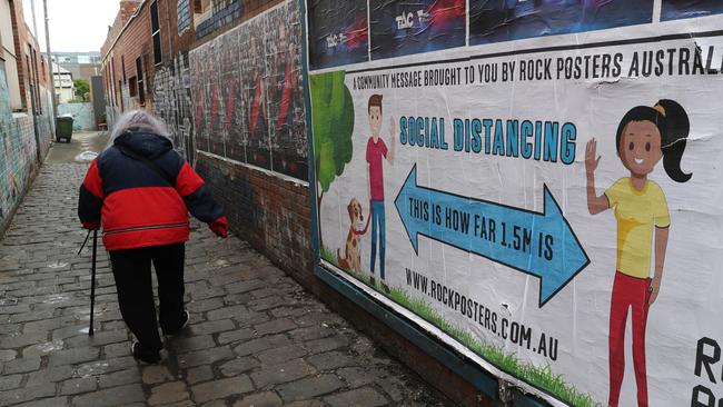 A sign explains social distancing in a laneway off a Sydney road. Picture: David Crosling