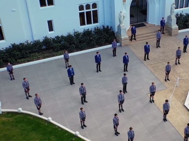 Marist College Ashgrove’s Performance Choir has shown its answer to social distancing by recording an awe inspiring 70 boy performance of “High Hopes” in front of the schools Tower Block. Picture: Supplied