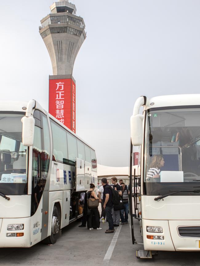 Musicians getting on buses outside Beijing Airport. Pic: Daniela Testa.