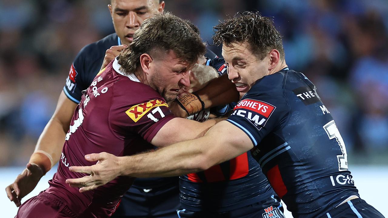 ADELAIDE, AUSTRALIA - MAY 31: Jai Arrow of the Maroons is tackled during game one of the 2023 State of Origin series between the Queensland Maroons and New South Wales Blues at Adelaide Oval on May 31, 2023 in Adelaide, Australia. (Photo by Cameron Spencer/Getty Images)