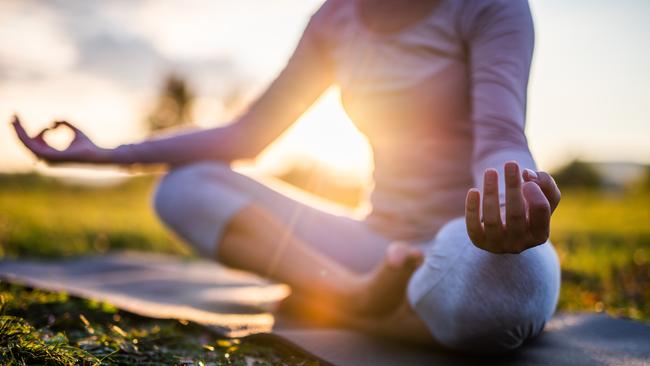 Yoga outdoor at sunset.