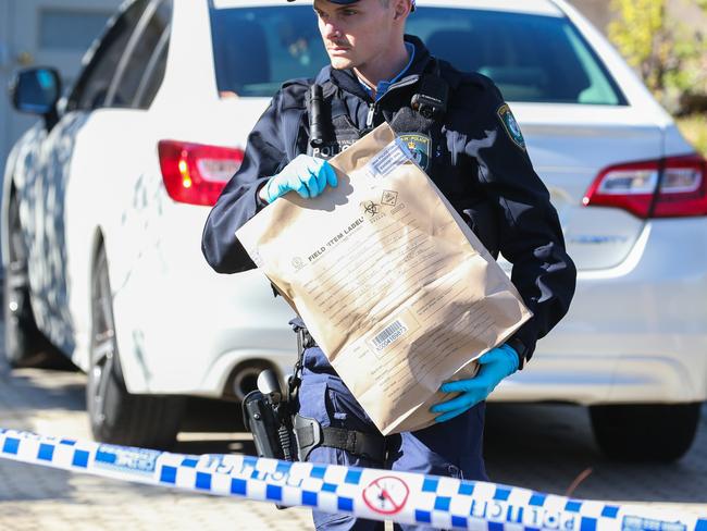 SYDNEY, AUSTRALIA: DAILY TELEGRAPH JUNE 16 2024:?? Police Forensics are seen at the home in Epping carrying out evidence bags after a man was found dead  and a woman has been arrested. About 11am (Saturday 15 June 2024), officers attached to Ryde Police Area Command were called to a home on Damon Street following reports of a concern for welfare. On arrival, police located the body of a man. While he is yet to be formally identified, he is believed to be aged in his 60Ãs. A woman who is also believed to be aged in her 60Ãs was arrested at the scene and taken to Gladesville Police Station where she is assisting police. A crime scene has been set up at the home while Police conduct an investigation. Picture: Daily Telegraph/ Gaye Gerard