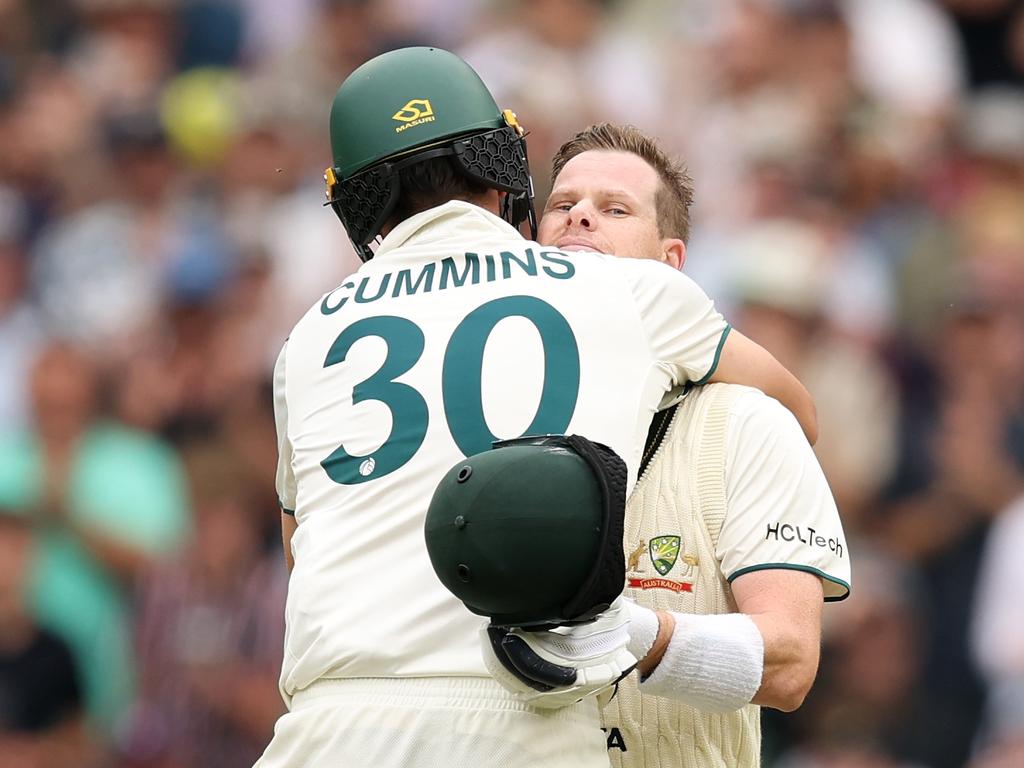 Steve Smith is congratulated by Pat Cummins after his century in the Boxing Day Test. Picture: Getty