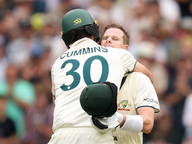 Steve Smith is congratulated by Pat Cummins after his century in the Boxing Day Test. Picture: Getty