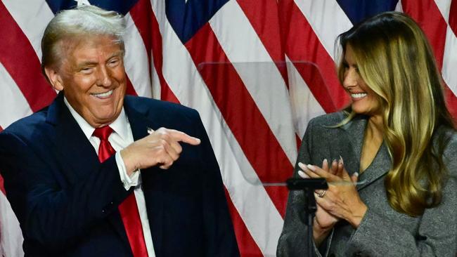 Donald Trump points to his wife former US First Lady Melania Trump during an election night event at the West Palm Beach Convention Center on November 6. Picture: AFP