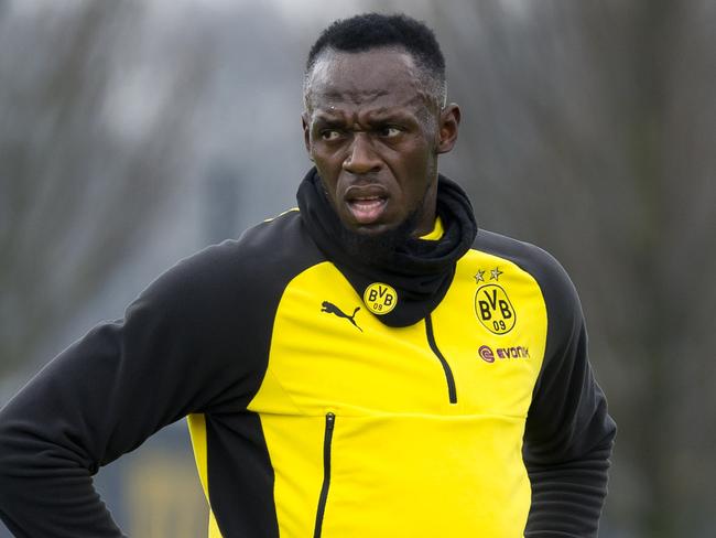 DORTMUND, GERMANY - MARCH 23: Usain Bolt looks on during a training session on March 23, 2018 in Dortmund, Germany. (Photo by TF-Images/TF-Images via Getty Images)