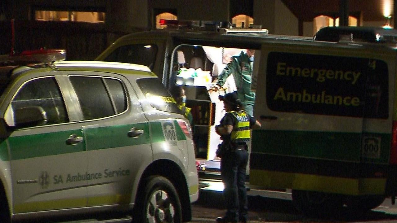 Paramedics at the scene where a boy and his mother were stabbed during a violent car robbery outside their Unley home. Picture: 7 News