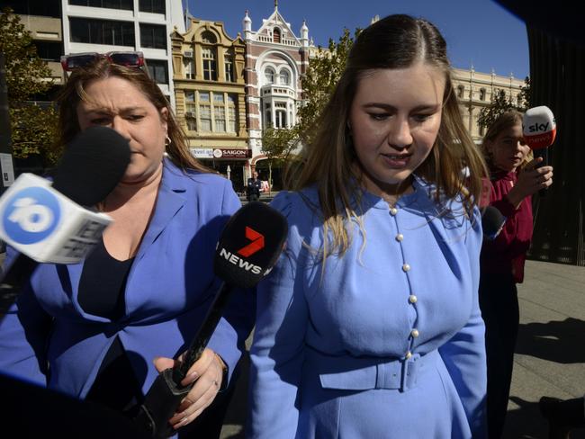 PERTH , AUSTRALIA - NewsWire Photos MARCH 5, 2024  Brittany Higgins arrives at Perth Supreme court with fiance David Sharaz.  Picture: NCA NewsWire / Sharon Smith